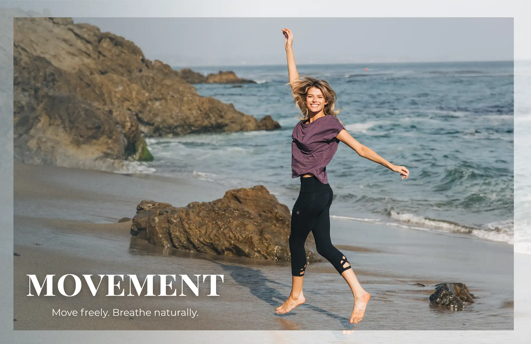 Woman on the beach wearing workout wear that raises your vibration.